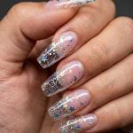 100pcs Transparent Nails and 2 pcs fake nails glue .
